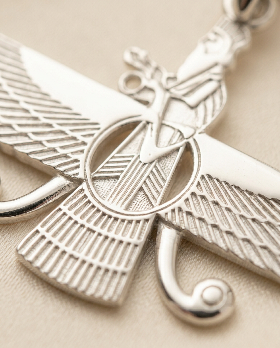 Macro detail of the engraved feather work on the 2D Asho Farohar pendant